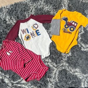 Three boys long sleeve onesies.